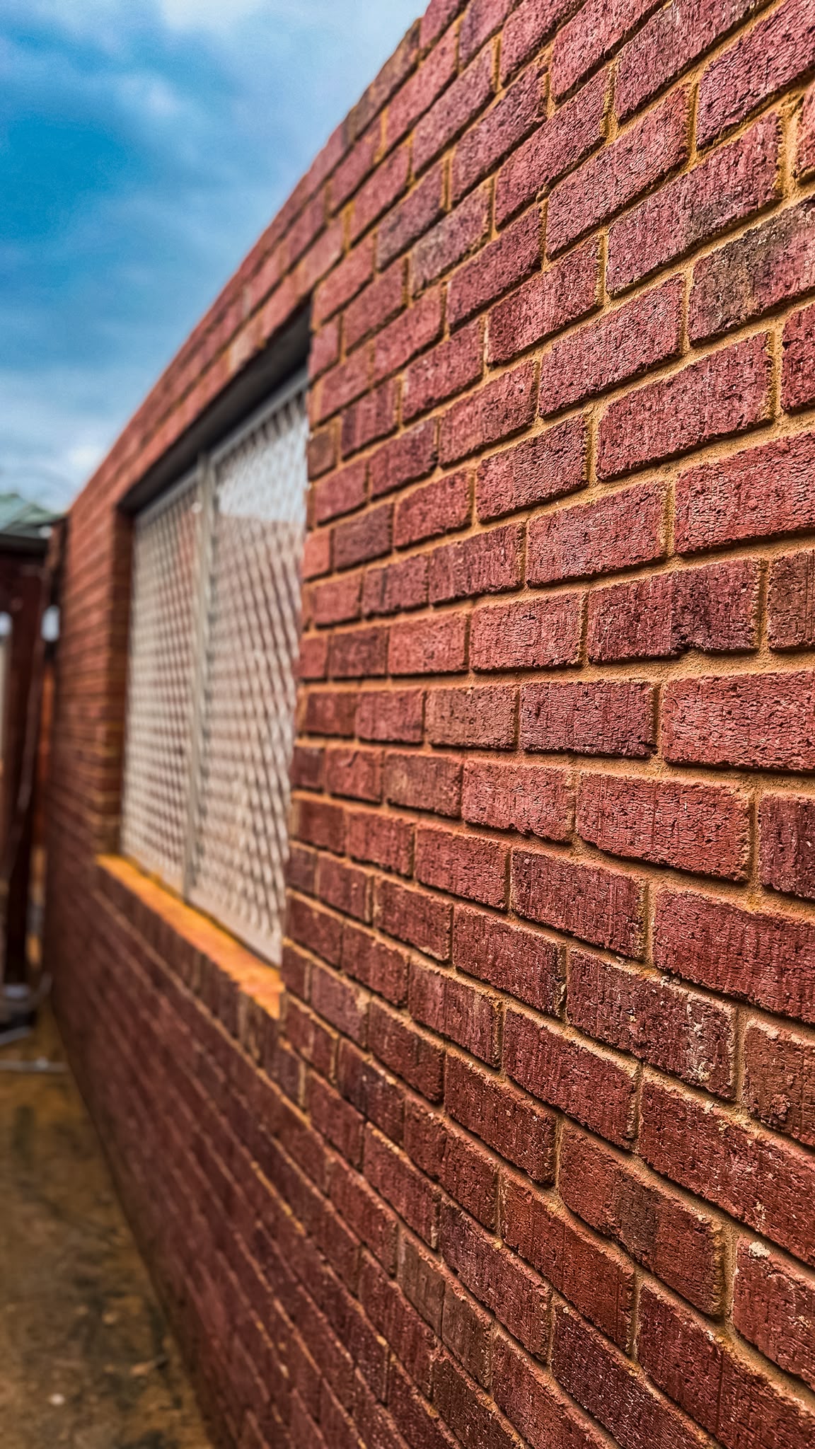 Cyandi Court Thornlie heritage red clay brick extension brickwork photo 11